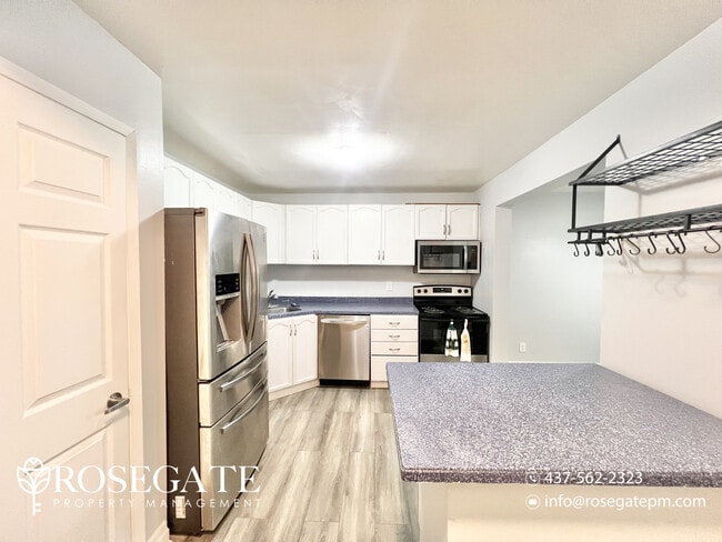 Building Photo - Spacious 3-Bedroom Stacked Townhouse – 1,5...