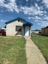Building Photo - 710 W Champ Clark Ave