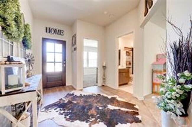 Building Photo - Open floor plan with custom upgrades, 4 be...