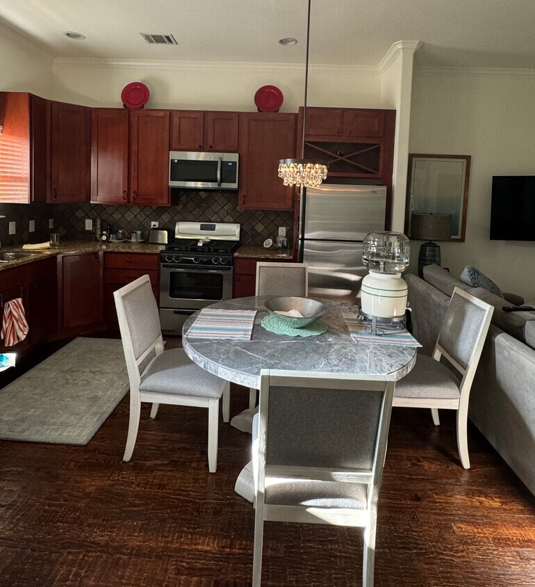 Granite and stainless steel appliances. - 5604 Lewis St