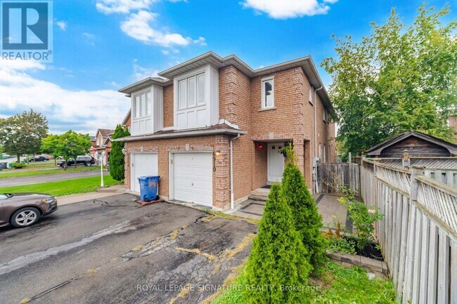 Building Photo - 6910 Bansbridge Crescent