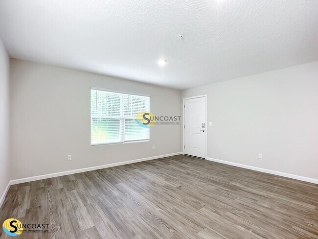 Foto del edificio - 6499 Breezy Oaks Wy