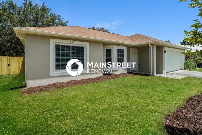 Building Photo - 4 Bedroom Pet-Friendly Home in Palm Bay, FL with Main Street Renewal