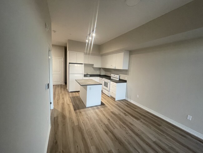 Building Photo - Spacious, Newly built Two Bedroom + Den, T...