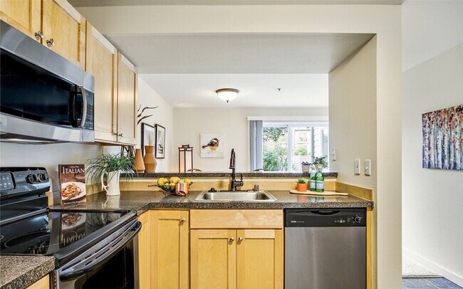 kitchen and dining area. - 6700 NE 182nd St