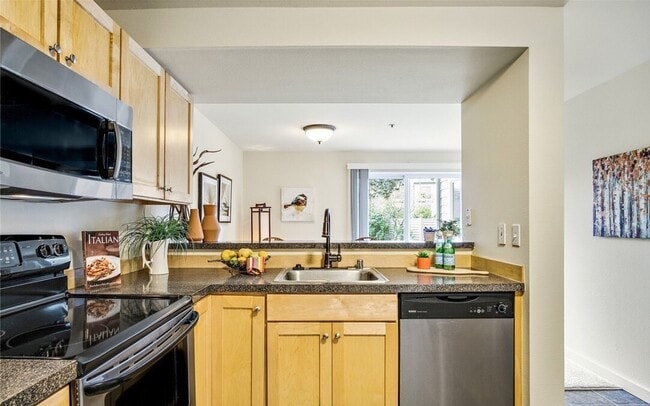 kitchen and dining area. - 6700 NE 182nd St