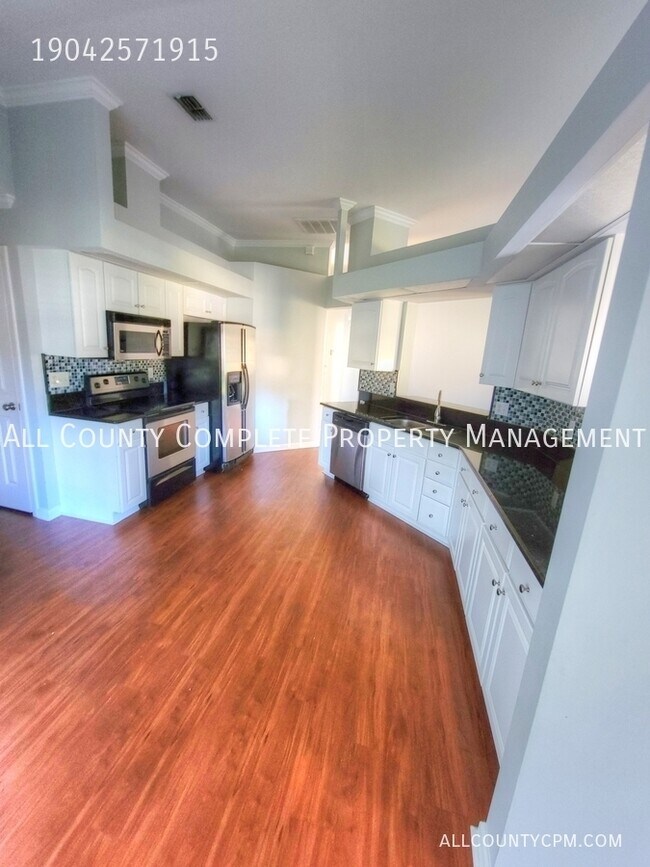 Building Photo - 11369 Sutton Lakes Ct