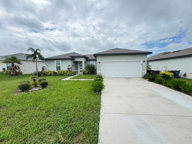 Building Photo - AWESOME 4BD/2BA in Beautiful POINCIANA!!!