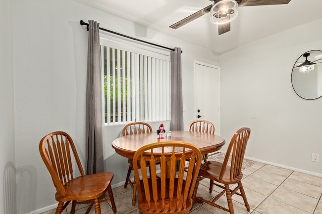 Dining room with backyard door - 115 W 10th St