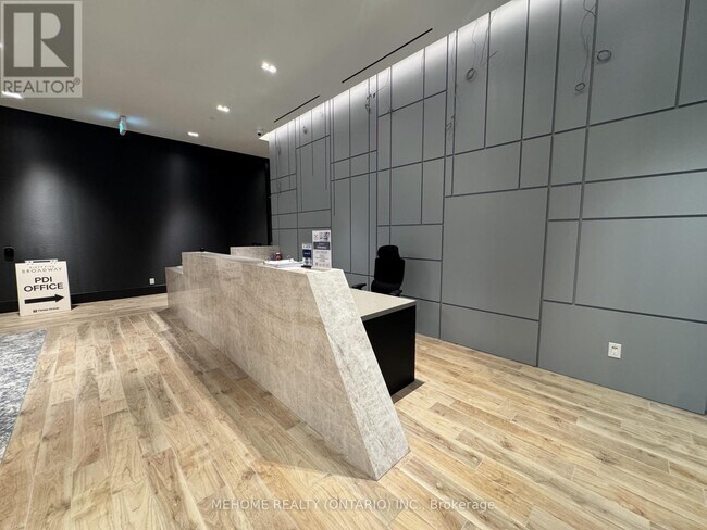 Photo du bâtiment - 65 Broadway Ave