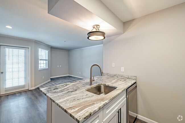 1 BD, 1 BA - 660 SF - Kitchen and Living Area - Mountain View Crossing