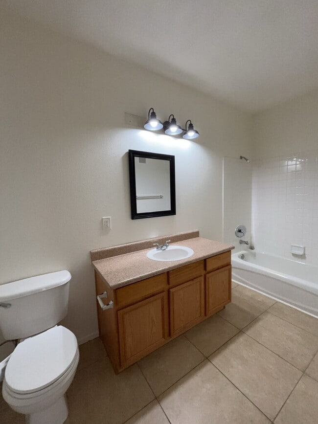 Building Photo - COZY 2 BEDROOM 2 FULL BATH CONDO LOCATED ON SECOND LEVEL