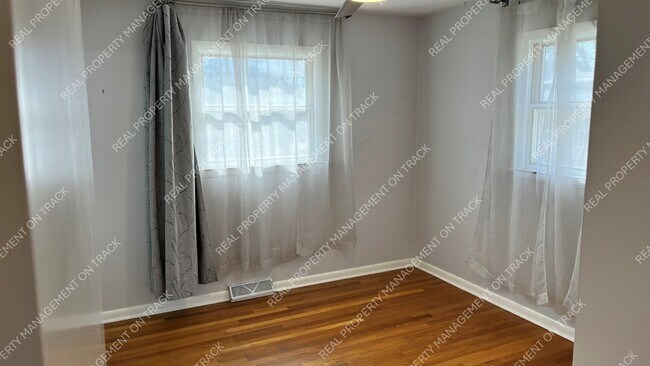 Building Photo - Peaceful 3-Bedroom Home in a Wooded Rockford Neighborhood