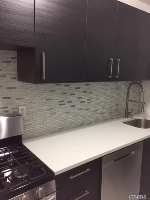 Building Photo - 100-25 Queens Blvd