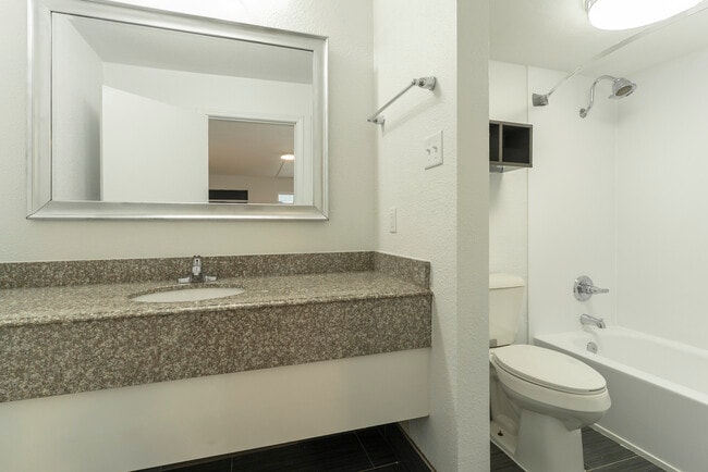 Building Photo - The Dels – Russellville