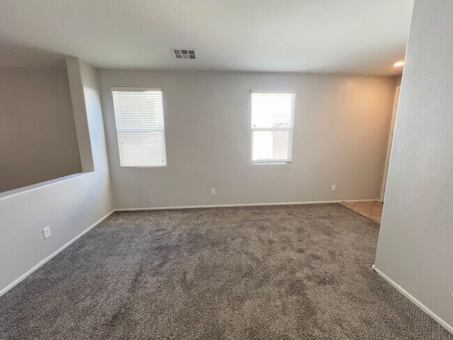 Building Photo - 4 bedroom, 3 bathroom home located in Southwest, NV!