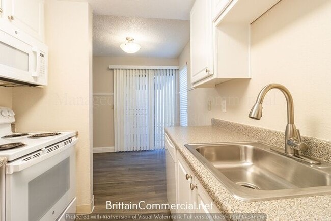 Building Photo - Spacious Two-Bedroom Townhome w/Modern Int...