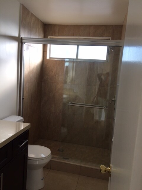 Renovated shower and bath bathroom - 1247 N Orange Grove Ave