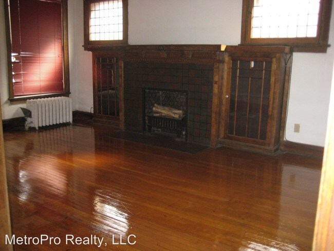 Building Photo - 7258 S Coles Ave
