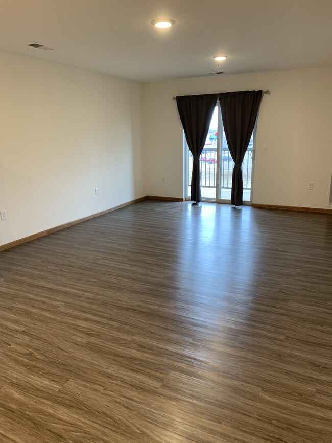 Área de sala de estar - Huntington Park Apartments