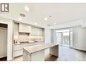 Building Photo - 7433 Cambie St.