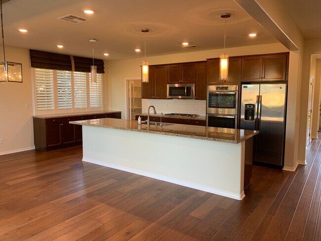 Building Photo - Former Model Home for Rent 4 bed downstair...