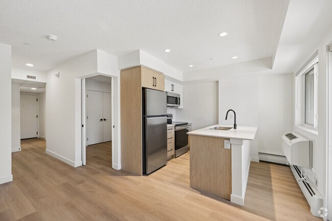 1BD, 1BA w/ Den - 544SF - Kitchen/ Living Room - ONE51