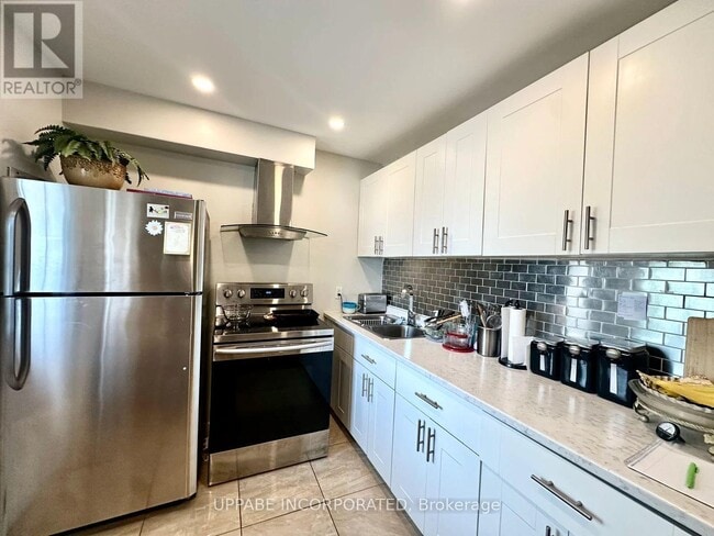 Building Photo - 240 Marier Ave