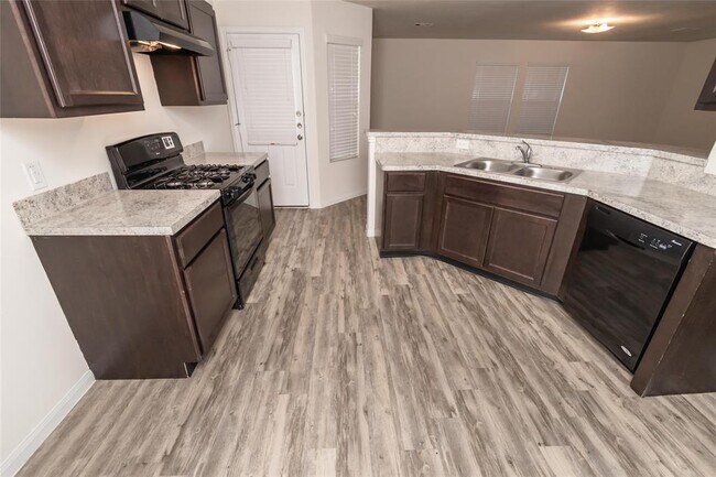 Foto del edificio - 5488 Quail Cove Ln