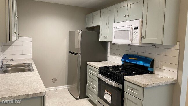 Building Photo - 2 br, 1 bath Condo - 9958 S 84th Ter Unit ...