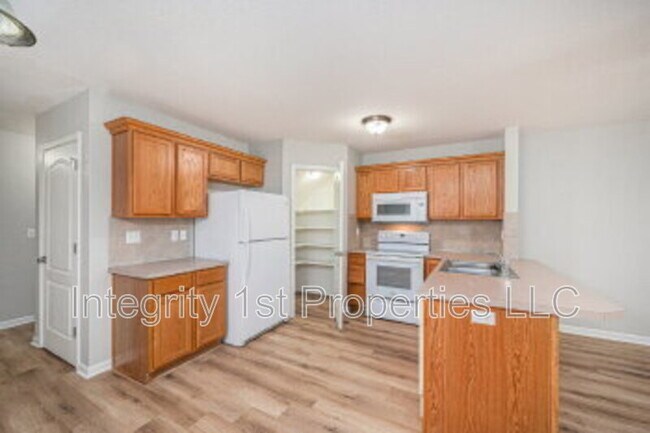 Foto del edificio - 9104 N Helena Ave