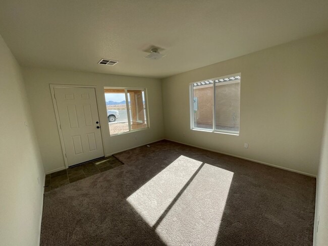 Building Photo - NEARLY NEW Home in the Desired Desert Sands Subdivision!