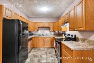 Building Photo - 9273-9294 94 Ave