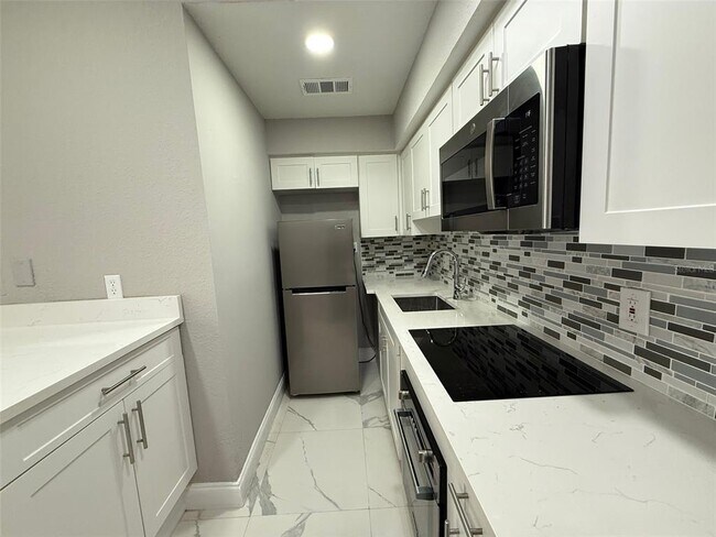 Foto del edificio - 9258 Lake Chase Island Way