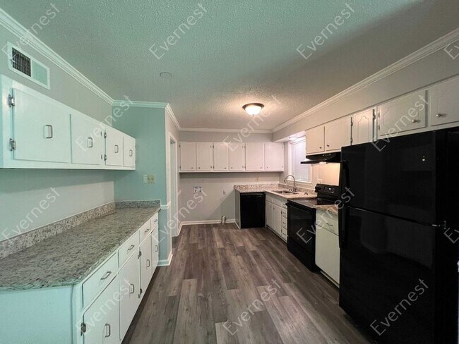Building Photo - 7077 Carrolton Dr W