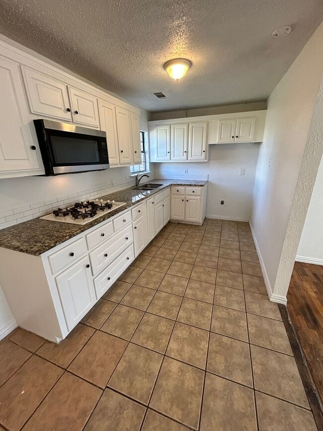 Building Photo - The stunning home feels like home!