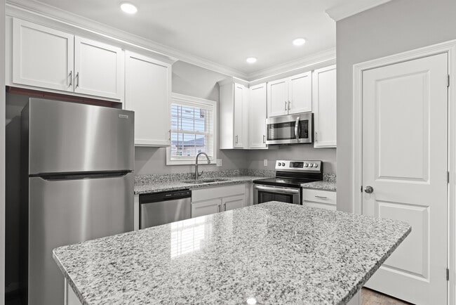 2BR, 2BA - 980 SF- Upstairs Kitchen - Keystone Commons