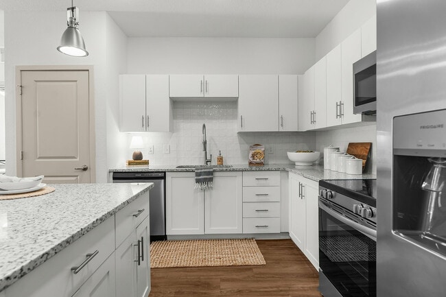 Experience the elegance and functionality of this modern kitchen design. - Livano Nature Coast