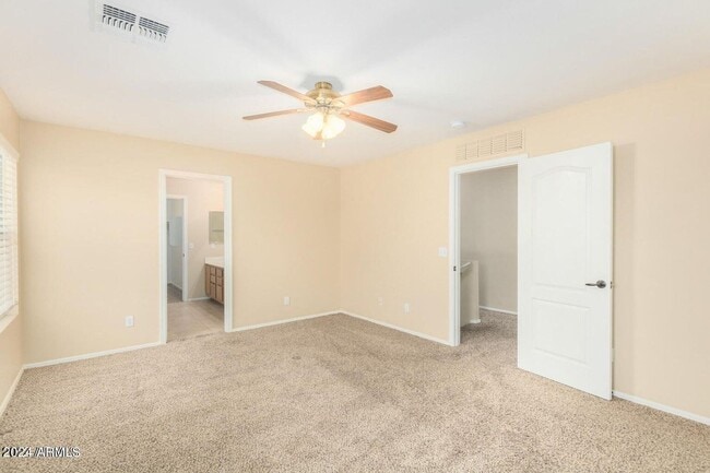 Building Photo - 3 Bedroom in Surprise Farms - PAID SOLAR! ...