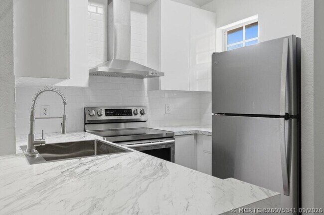Foto del edificio - 6143 Garden Ct