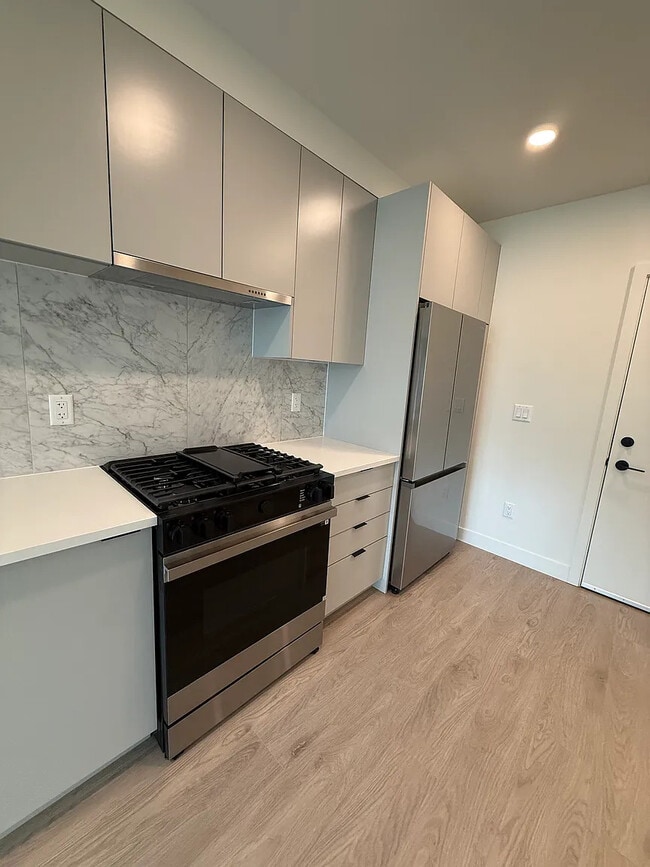 Building Photo - 13238-13105 105 Ave