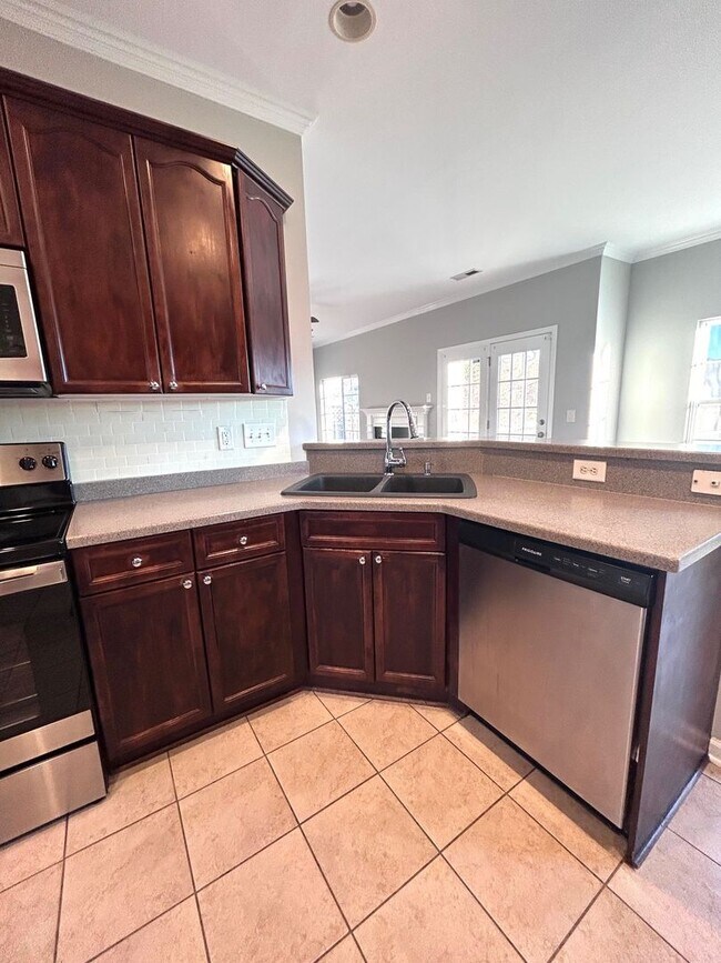 Building Photo - Stunning 4BR Home with amazing pond views!