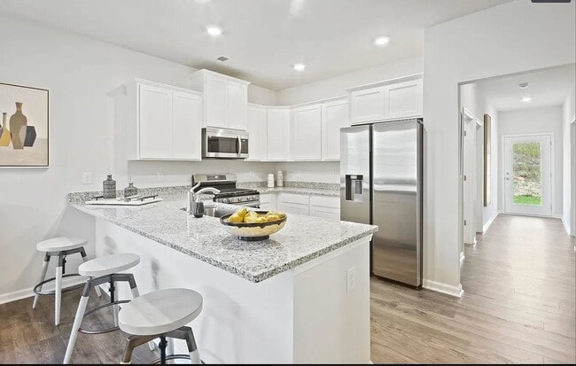 Building Photo - Large 3 Bedroom Townhome Coming Soon!