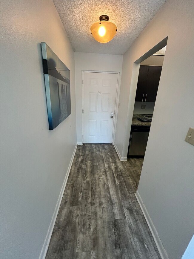 Building Photo - Now Leasing: 1-bedroom and 1.5 bath condo ...