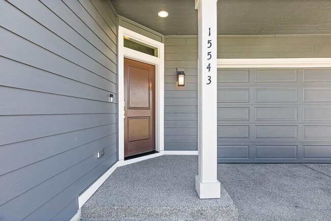Building Photo - Modern 4-Bedroom Yelm Home with Covered Patio, Outdoor Fireplace & Office/Flex Space!