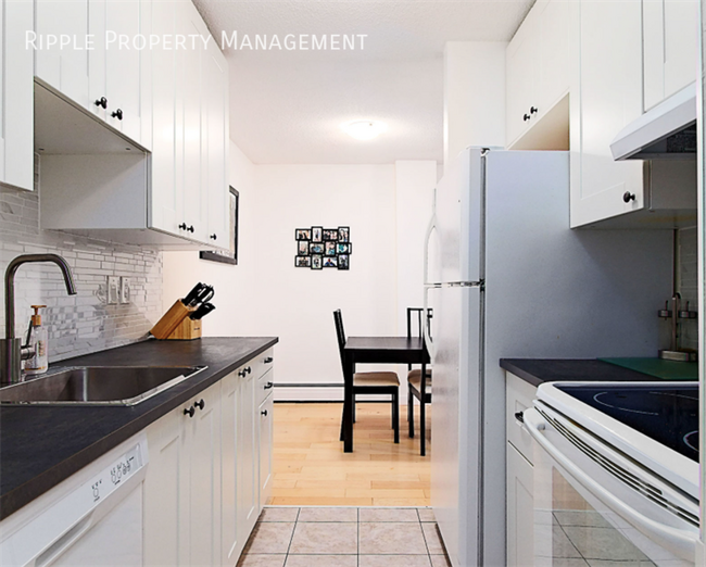 Photo du bâtiment - Modern 2 Beds, 1.5 Baths Apartment/Condo |...