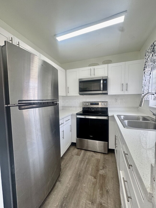 Photo - 5889 W 26th Ave Apartment