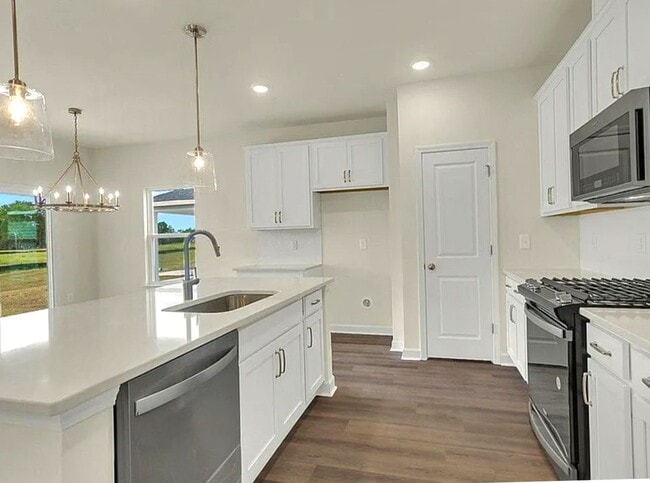 Building Photo - Four bedroom two bath home in Trieste at B...