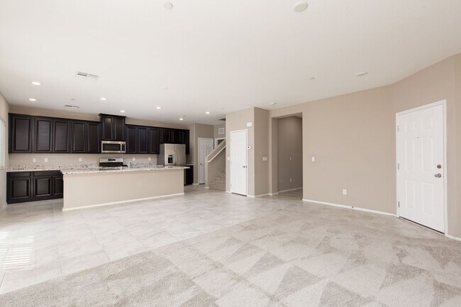 Building Photo - Stunning townhome in gated community with ...