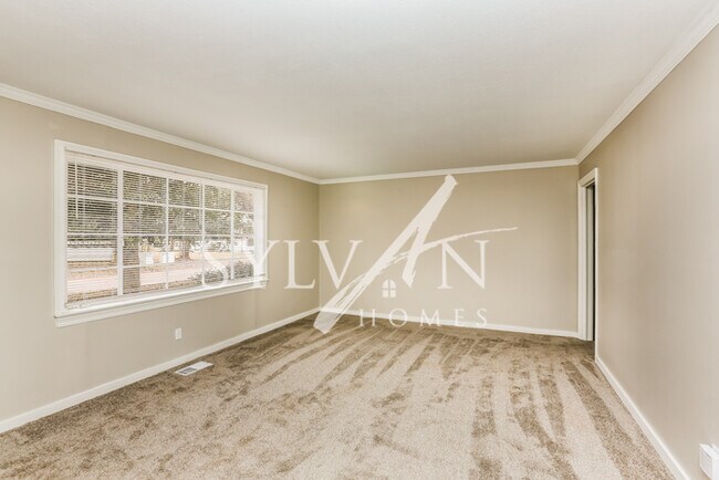 Building Photo - The living is easy in this 3 bedroom, 2 ba...